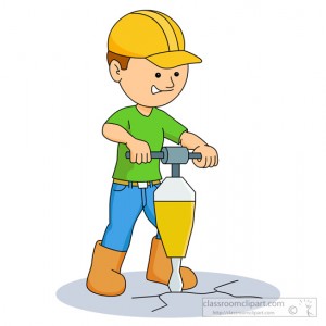 man drilling on ground with jackhammer