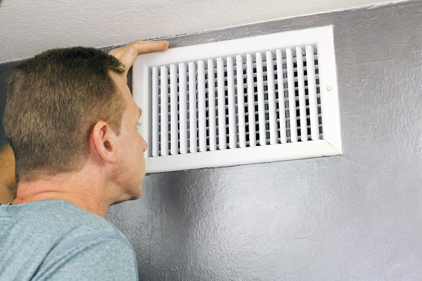 a man peers into his vents | north charleston duct sealing